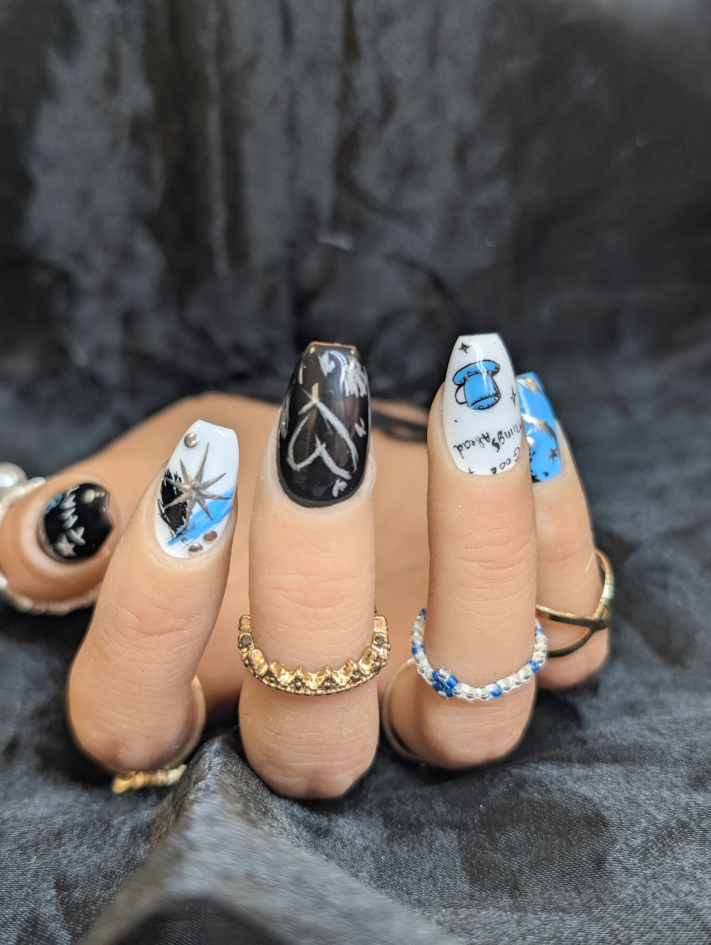 Press on nails between this & that