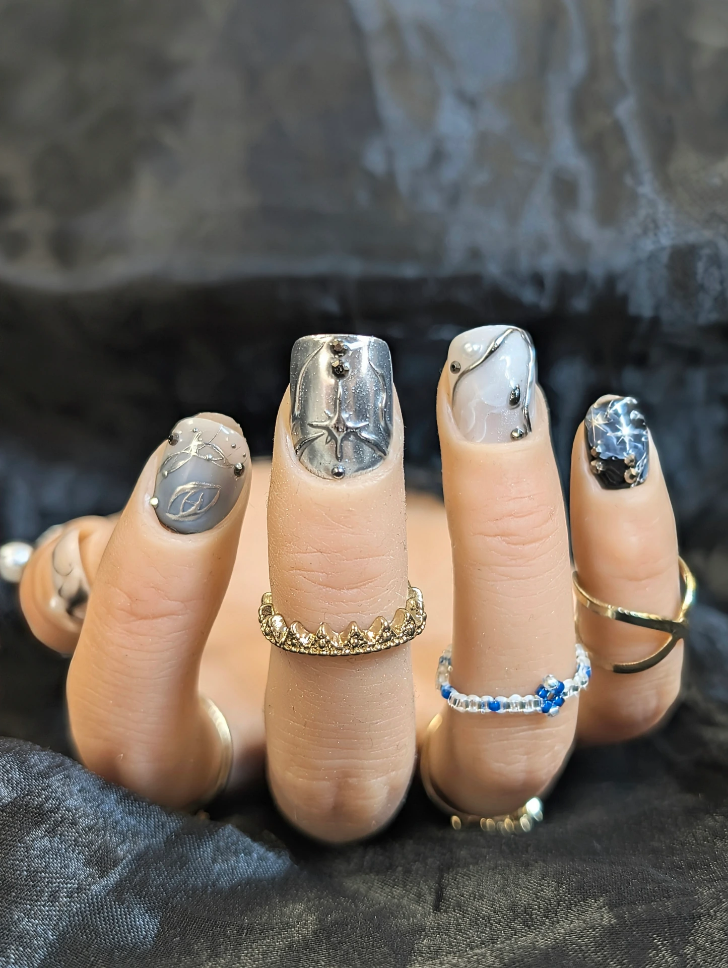Press on nails beneath the veil